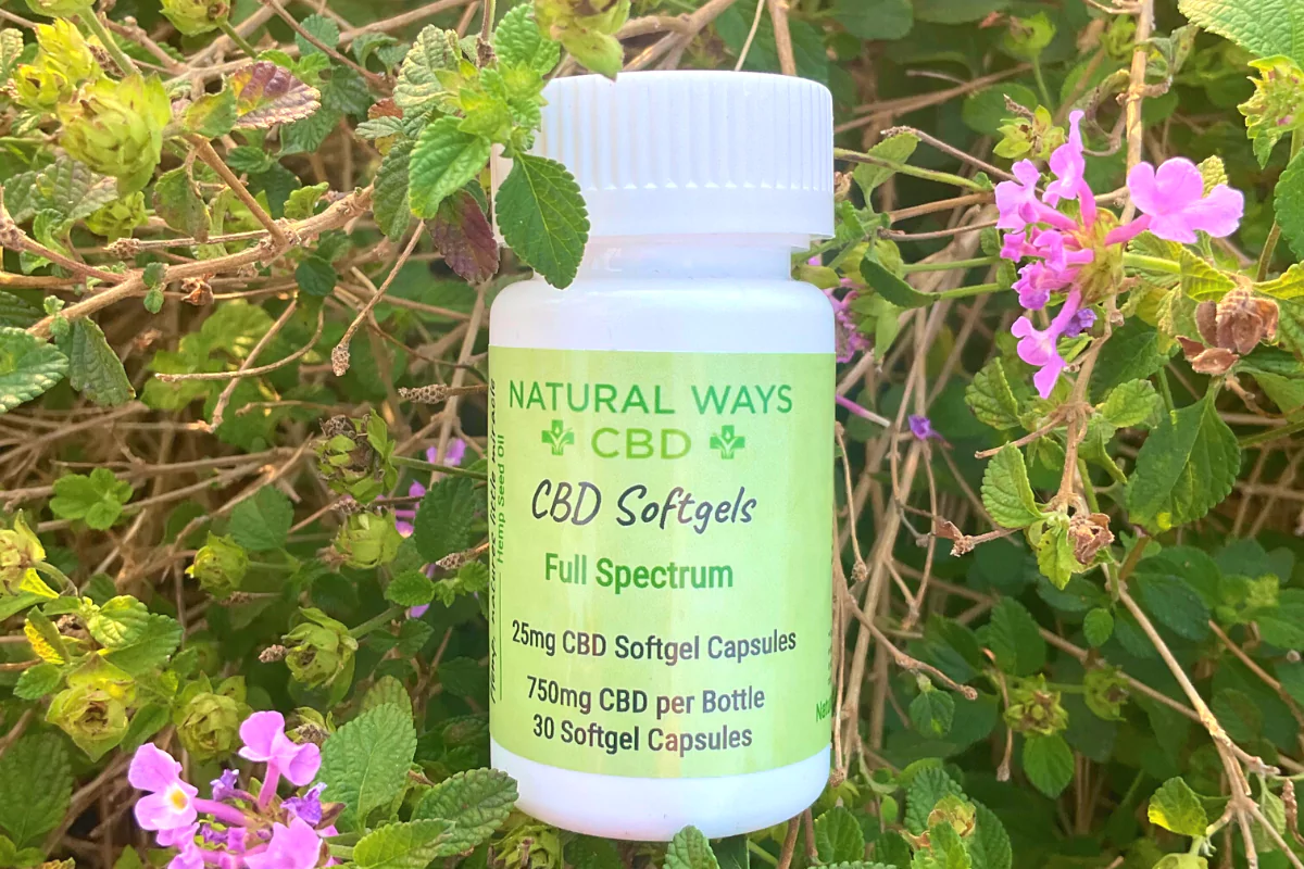 Natural Ways CBD CBD softgel capsules in nature